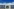 Im Vordergrund steht eine Wärmepumpe und im Hintergrund ist eine Photovoltaikanlage auf dem Dach zu sehen.